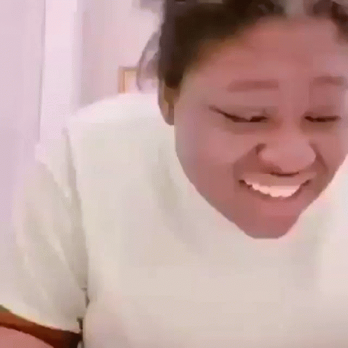 Woman Smiling and Making Funny Face