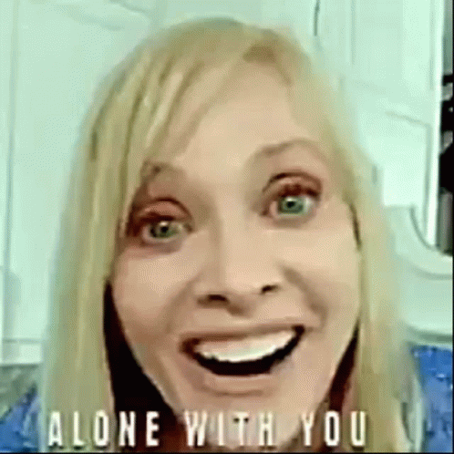 Woman Smiling and Making Funny Face Saying Alone With You