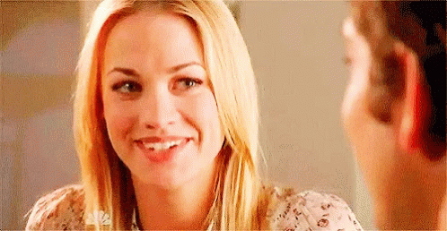 Woman Smiling At Man In Mirror GIF