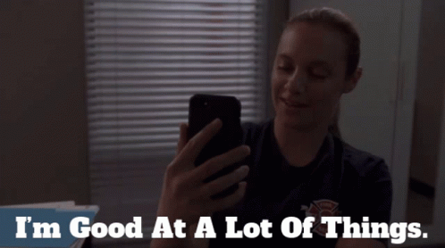 Woman Smiling at Phone I'm Good at a Lot of Things