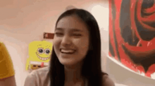 Woman Smiling Eyes Closed With SpongeBob Painting GIF