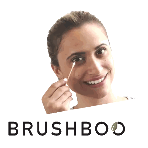 Woman Smiling Holding Cotton Swab