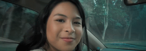 Woman Smiling In Car With Trees GIF