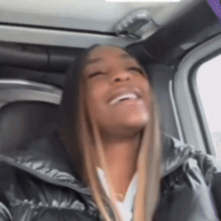 Woman Smiling in Car