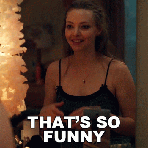 Woman Smiling Saying That's So Funny