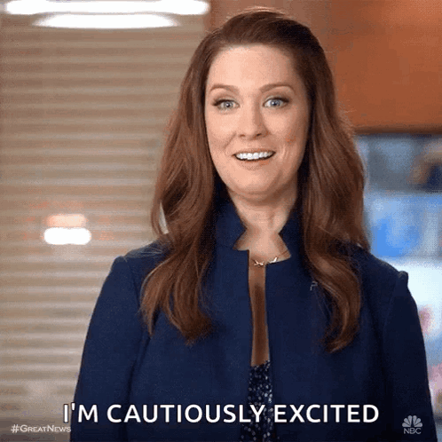Woman Smiling Says I'm Cautiously Excited GIF
