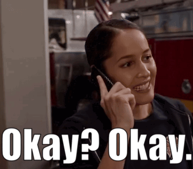 Woman Smiling Talking on Cell Phone Okay Okay