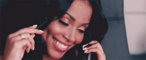 Woman Smiling Talking on Phone
