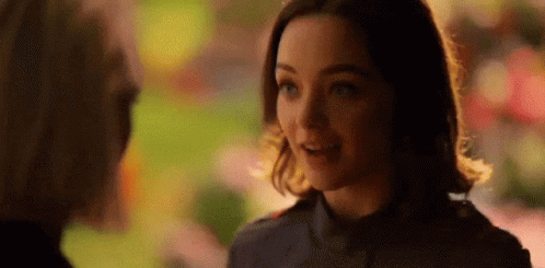 Woman Smiling Talking To Man GIF