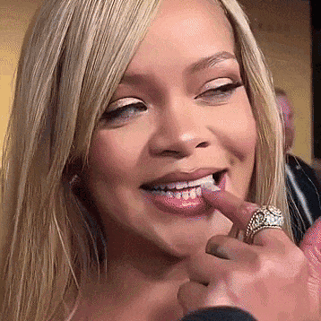 Woman Smiling Wearing Ring