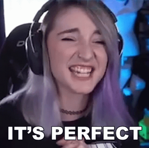 Woman Smiling with Headphones Saying Perfect