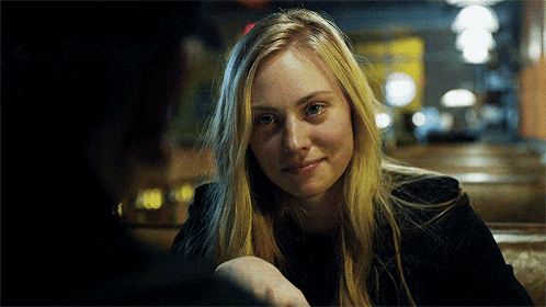 Woman Smiling With Man At Table GIF
