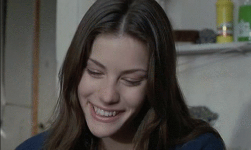 Woman Smiling With Teeth Showing