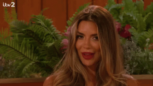 Woman Smiling With Wine Glass By TV ITV2 GIF