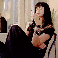 Woman Smoking Cigarette with Bracelets
