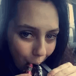 Woman Smoking Three Vape GIF