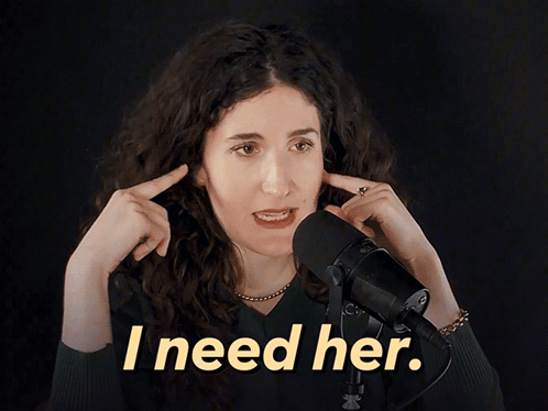 Woman Speaking Into Microphone Saying I Need Her