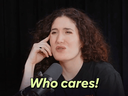 Woman Speaking Into Microphone Who Cares