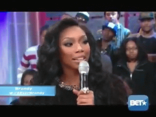 Woman Speaking Into Microphone With BET Logo GIF