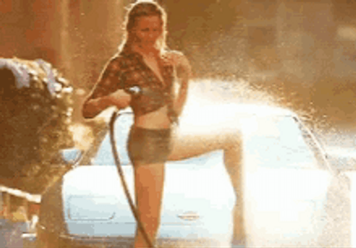 Woman Spray Water To Wet Tshirt GIF
