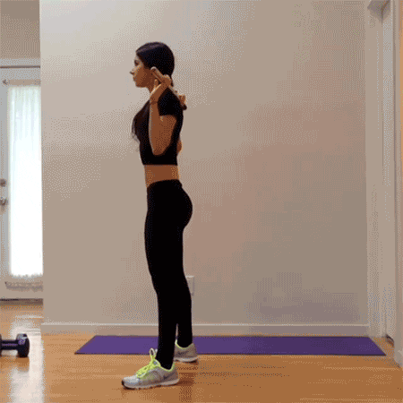 Woman Squats With Stick GIF