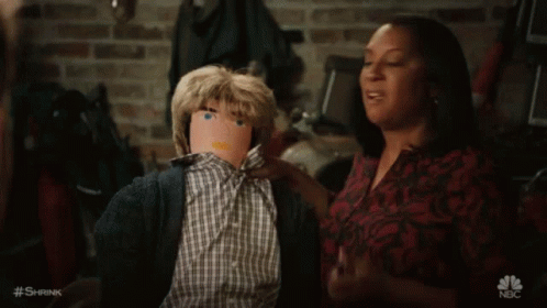 Woman Stabbing A Doll GIF