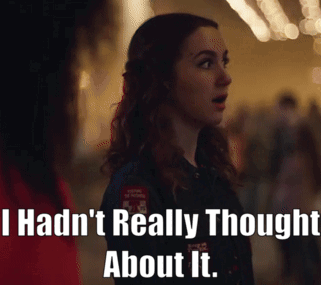Woman Standing Before I Hadn't Really Thought About It Sign GIF