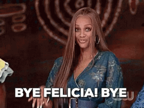 Woman Standing By Sign Saying Bye Felicia