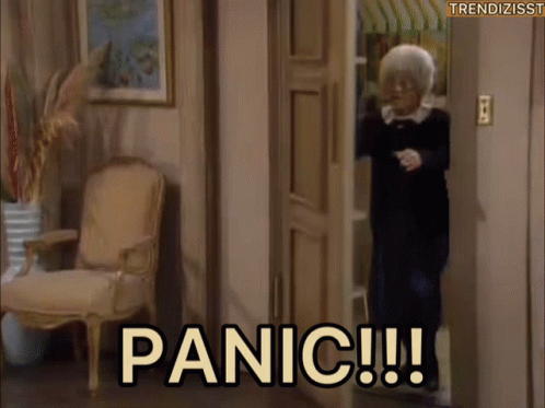 Woman Standing in Doorway With Panic