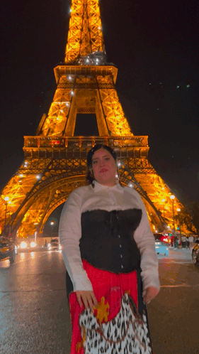 Woman Standing in Front of Eiffel Tower