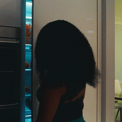 Woman Standing In Front Of LG Refrigerator GIF