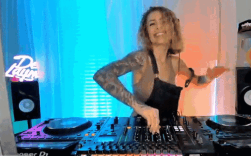 Woman Standing In Front Of Pioneer DJ Mixer GIF
