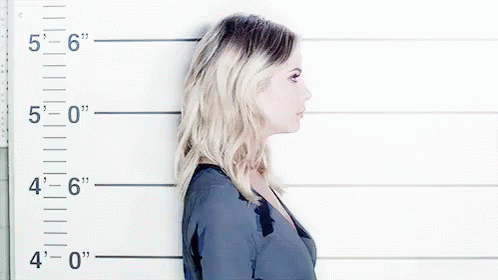 Woman Standing in Front of Police Lineup