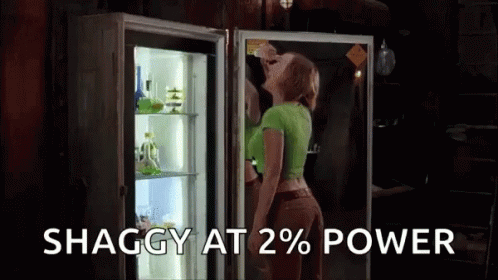 Woman Standing In Front Of Refrigerator GIF