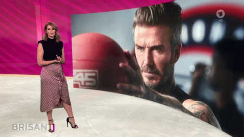 Woman Standing in Front of Screen Saying Brisant
