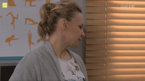 Woman Standing In Front Of TVP HD Sign GIF