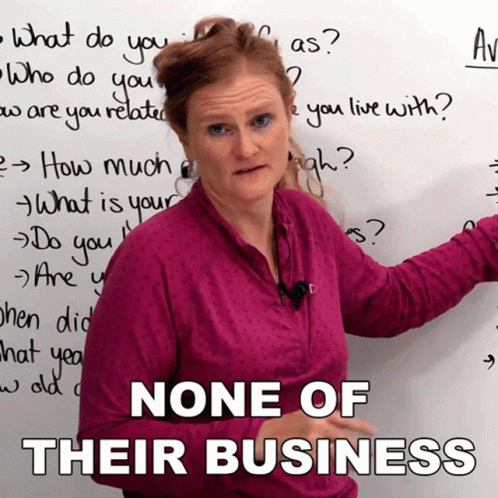 Woman Standing in Front of Whiteboard None of Their Business