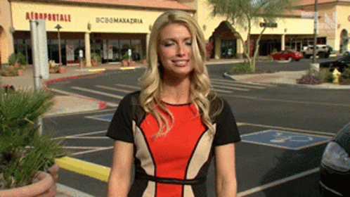Woman Standing in Parking Lot