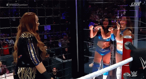 Woman Standing In Wrestling Ring GIF