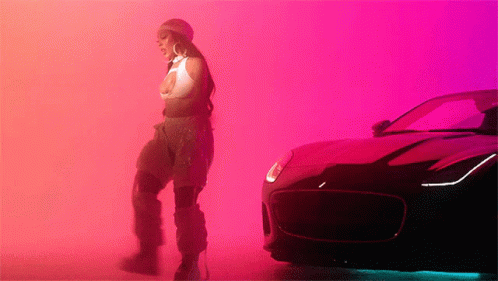 Woman Standing Next to Car Pink Background