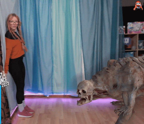 Woman Standing Next to Monster 2022