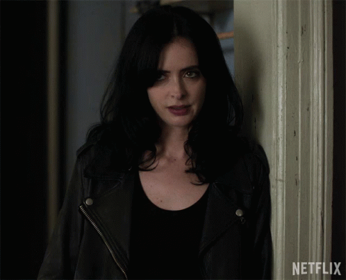 Woman Standing Next to Netflix Door