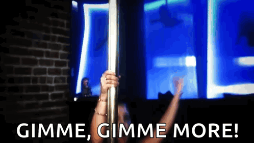 Woman Standing on Pole Gimme Gimme More
