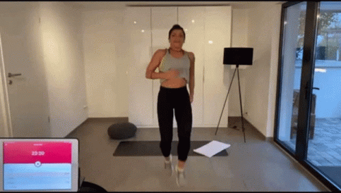 Woman Standing On Yoga Mat GIF