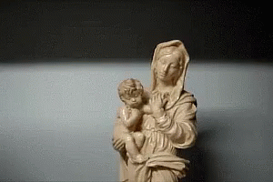 Woman Statue Holding Baby GIF