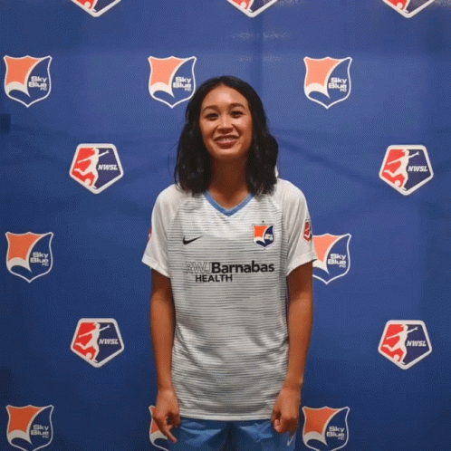 Woman Sticking Tongue Out While Doing Hook Em Sign GIF