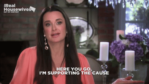 Woman Supporting Cause In Front Of Candles GIF