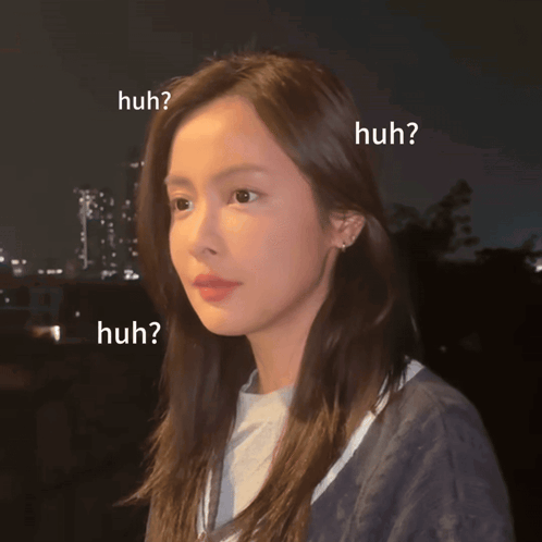 Woman Surrounded By Huh Text GIF