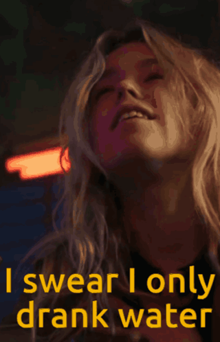 Woman Swears She Only Drank Water Holding Glass GIF