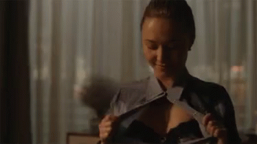 Woman Taking Off Shirt And Bra GIF